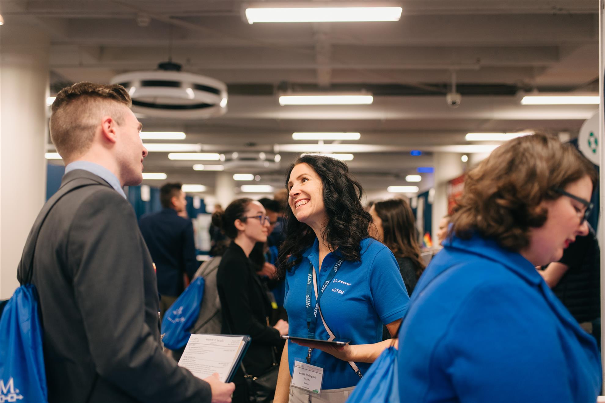 Conference 2019 - People smiling and talking