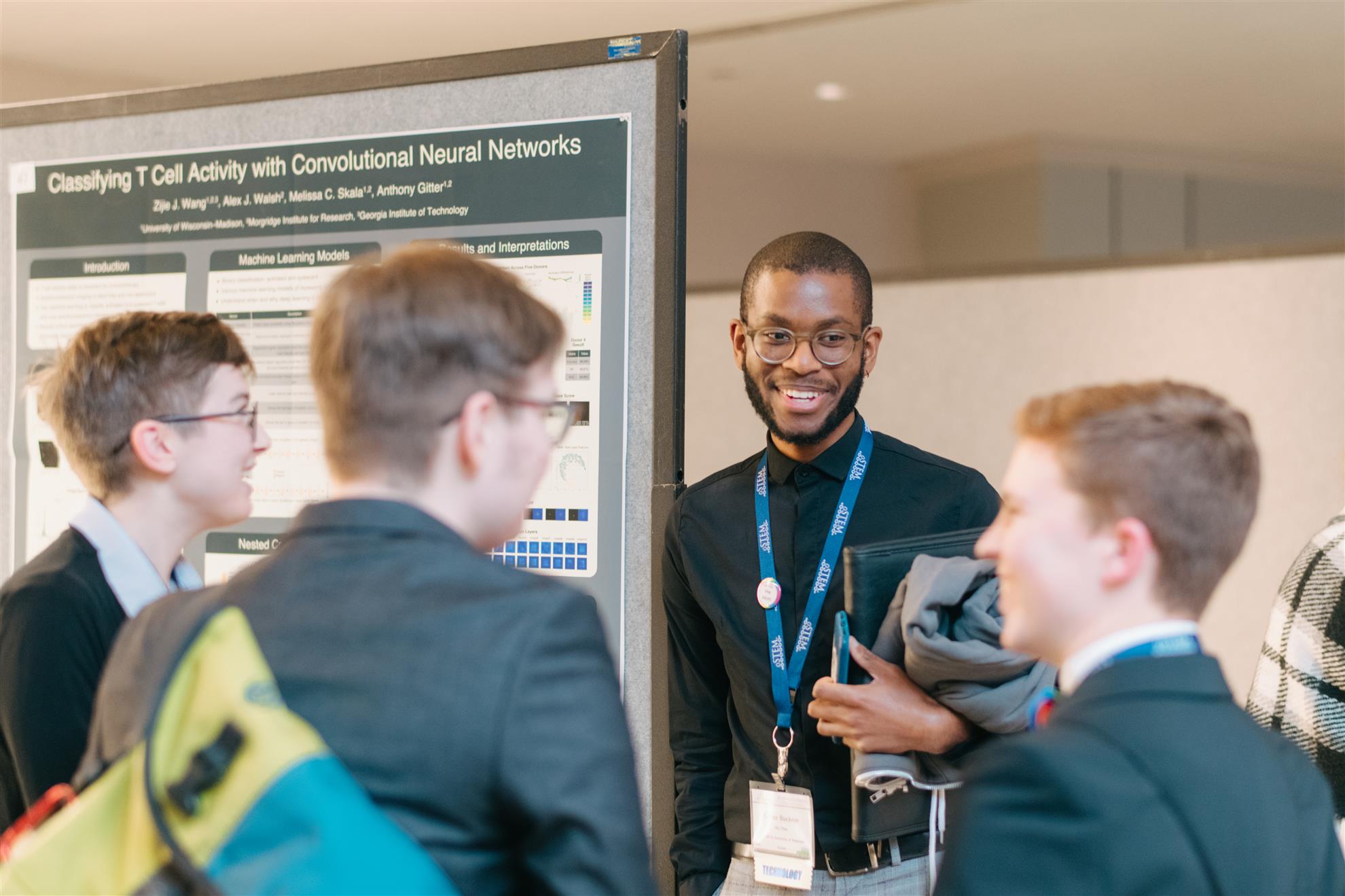 Conference 2019 - People smiling and talking